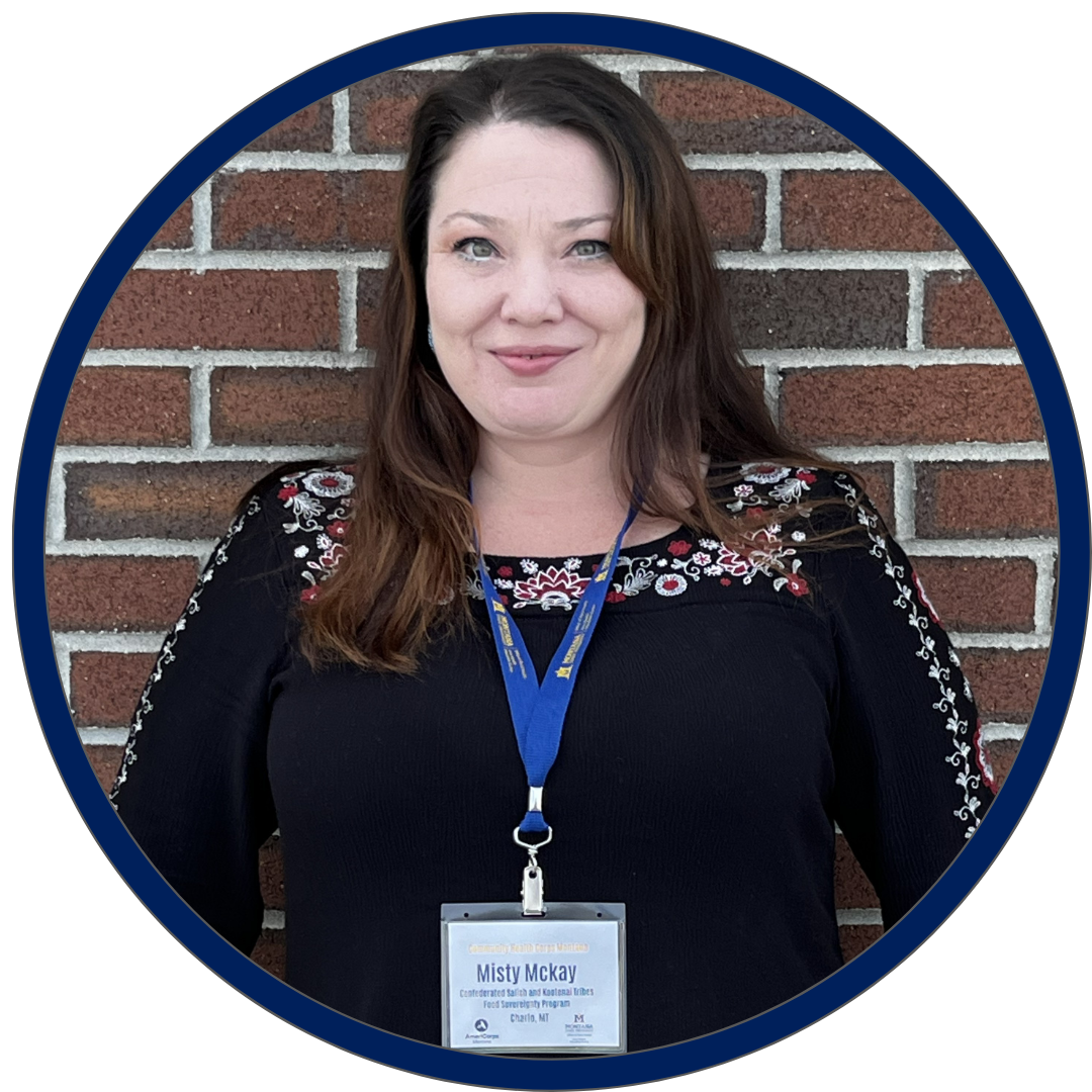 headshot of CHCM member Misty standing in front of brick wall
