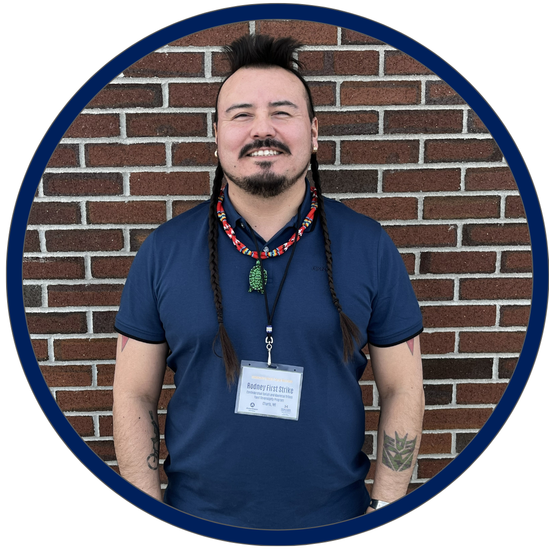 headshot of CHCM member Rodney standing in front of brick wall